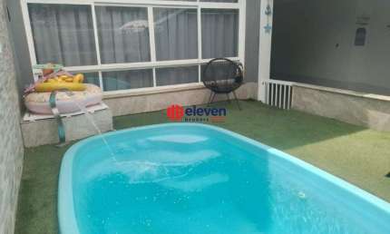 SOBRADO PONTA DA PRAIA 4 DORMITÓRIOS 3 SUÍTES AMERICANAS 3 VAGAS DE GAARAGEM PISCINA E QUINTAL