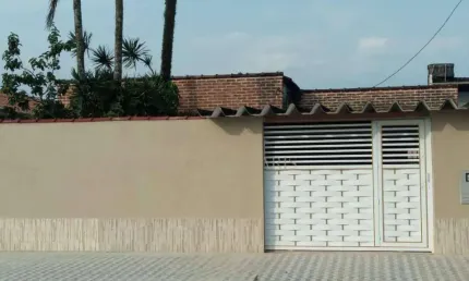 Casa com 3 dormitórios à venda, 135 m² por R$ 600.000,00 - Maracanã - Praia Grande/SP