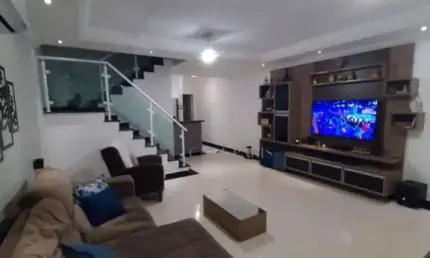 Sobrado à venda, 121 m² por R$ 605.000,00 - Maracanã - Praia Grande/SP