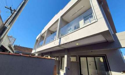 Sobrado com 2 dormitórios à venda, 80 m² por R$ 650.000,00 - Caiçara - Praia Grande/SP