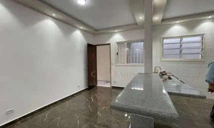 Casa com 2 dormitórios à venda, 100 m² por R$ 375.000,00 - Caiçara - Praia Grande/SP