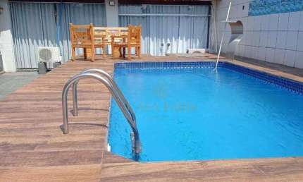 Casa com 3 dormitórios à venda, 360 m² por R$ 850.000,00 - Tude Bastos - Praia Grande/SP