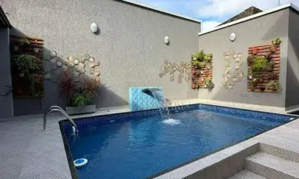 Sobrado com 2 dormitórios à venda, 54 m² por R$ 330.000,00 - Maracanã - Praia Grande/SP