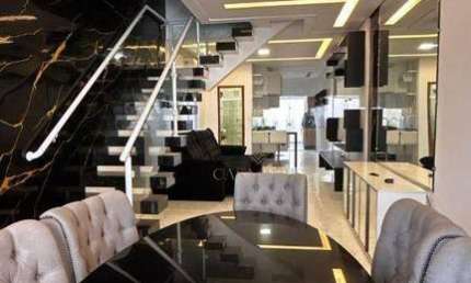 Sobrado com 3 dormitórios à venda, 125 m² por R$ 970.000,00 - Ocian - Praia Grande/SP
