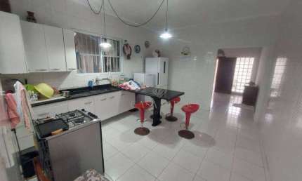 Casa com 2 dormitórios à venda, 114 m² por R$ 550.000,00 - Caiçara - Praia Grande/SP