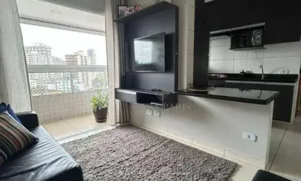 Apartamento com 2 dormitórios à venda, 64 m² por R$ 400.000,00 - Caiçara - Praia Grande/SP