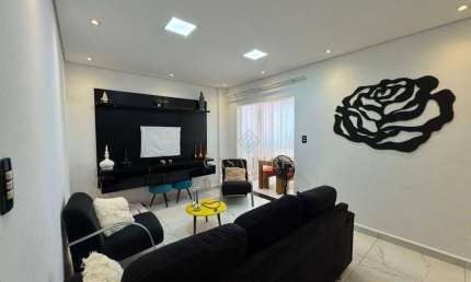 Apartamento com 2 dormitórios à venda, 65 m² por R$ 340.000,00 - Caiçara - Praia Grande/SP