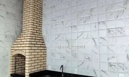 Casa com 3 dormitórios à venda, 100 m² por R$ 850.000,00 - Tupi - Praia Grande/SP