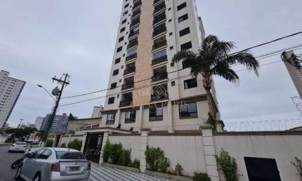 Apartamento com 2 dormitórios à venda, 65 m² por R$ 385.000,00 - Caiçara - Praia Grande/SP