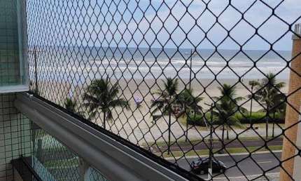 Apartamento com 2 dormitórios à venda, 80 m² por R$ 560.000,00 - Caiçara - Praia Grande/SP
