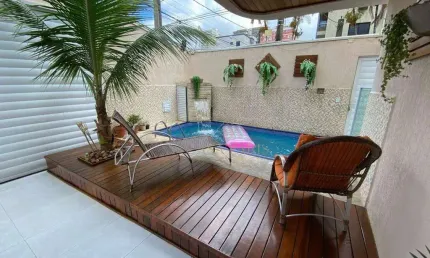 Sobrado com 4 dormitórios à venda, 164 m² por R$ 1.800.000,00 - Tupi - Praia Grande/SP