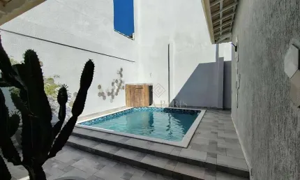 Casa com 4 dormitórios à venda, 127 m² por R$ 1.739.000,00 - Caiçara - Praia Grande/SP