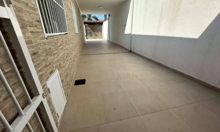 Casa com 2 dormitórios à venda, 150 m² por R$ 800.000,00 - Caiçara - Praia Grande/SP