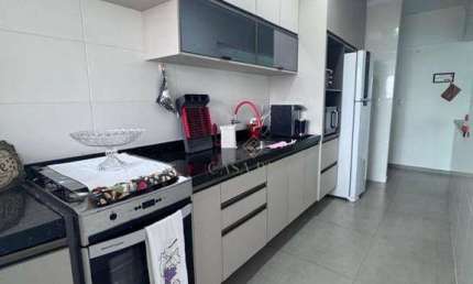 Apartamento com 2 dormitórios à venda, 82 m² por R$ 620.000,00 - Vila Guilhermina - Praia Grande/SP