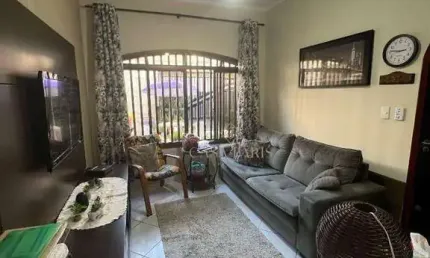 Casa com 2 dormitórios à venda, 56 m² por R$ 550.000,00 - Tupi - Praia Grande/SP