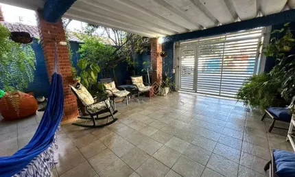 Casa com 3 dormitórios à venda, 150 m² por R$ 1.250.000,00 - Canto do Forte - Praia Grande/SP