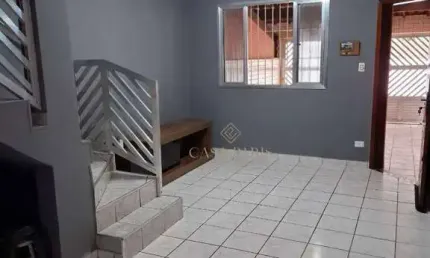 Casa com 2 dormitórios à venda, 117 m² por R$ 580.000,00 - Vila Guilhermina - Praia Grande/SP