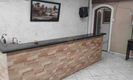 Casa com 2 dormitórios à venda, 125 m² por R$ 562.000,00 - Aviação - Praia Grande/SP