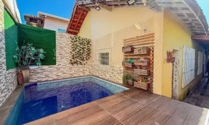 Casa com 2 dormitórios à venda, 70 m² por R$ 420.000,00 - Caiçara - Praia Grande/SP