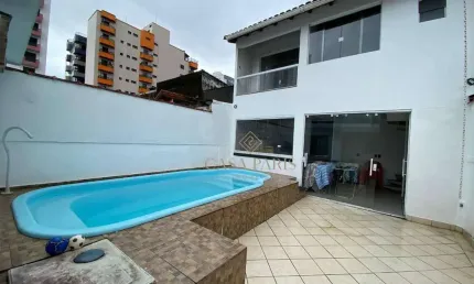 Casa 2 dormitórios com piscina à venda, 210 m² por R$  - Tupi - Praia Grande/SP