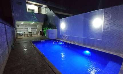 Sobrado com 3 dormitórios à venda, 155 m² por R$ 875.000 - Vila Tupi - Praia Grande/SP