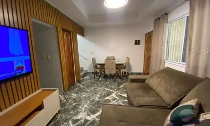 Casa com 3 dormitórios à venda, 63 m² por R$ 580.000,00 - Vila Guilhermina - Praia Grande/SP