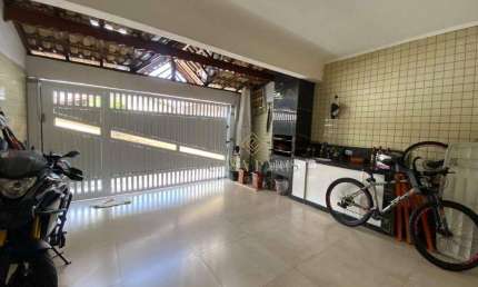 Casa com 3 dormitórios à venda, 93 m² por R$ 580.000,00 - Vila Guilhermina - Praia Grande/SP
