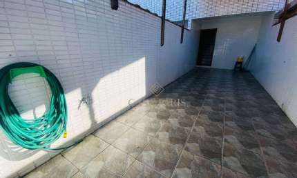 Sobrado com 3 dormitórios à venda, 105 m² por R$ 430.000 - Tude Bastos - Praia Grande/SP