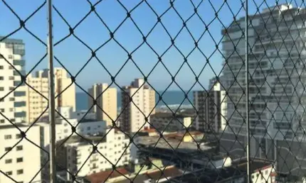 Apartamento com 2 dormitórios à venda, 85 m² por R$ 570.000,00 - Vila Guilhermina - Praia Grande/SP