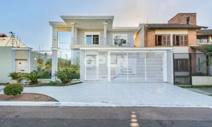 Sobrado de alto padrão à venda no Moinhos de Vento, Canoas – 3 suítes, piscina e 4 vagas