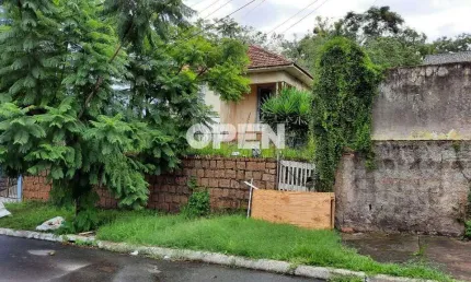 Terreno 11x50 à venda no bairro Nossa Senhora das Graças, Canoas – Com Casa