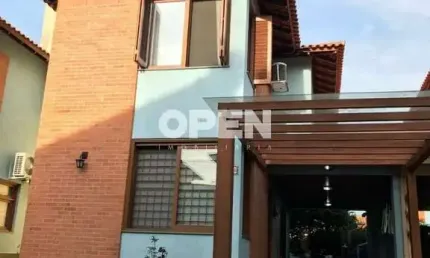 Casa em condomínio fechado com 3 quartos para alugar na Rua dos Jasmins, Igara, Canoas