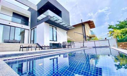 Casa em condomínio fechado com 4 quartos à venda na Avenida das Caúnas, Granja Viana, Carapicuíba por R$ 3.998.000