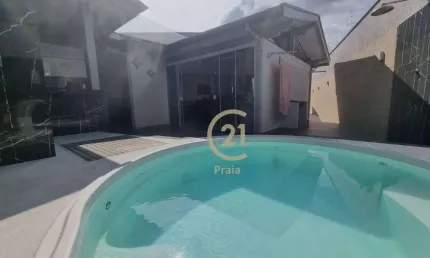 Casa com 2 dormitórios e edícula à venda, 203 m² por R$ 1.350.000 - Centro - Caraguatatuba/SP