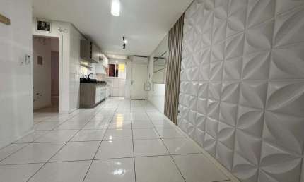 APARTAMENTO SEMIMOBILIADO  COM 61 M² PRIVATIVOS COM 2 DORMITÓRIOS E 2 VAGAS NO B