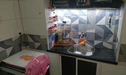 Apartamento tipo conjugado com cozinha separada no centro do Rio de Janeiro