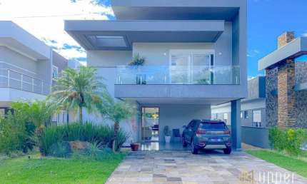 Casa com 4 dormitórios à venda, 200 m² por R$ 2.090.000 - Alphaville - Gravataí/RS