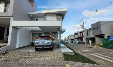 Casa com 3 dormitórios à venda, 140 m² por R$ 899.000,00 - Condomínio Primavera - Gravataí/RS