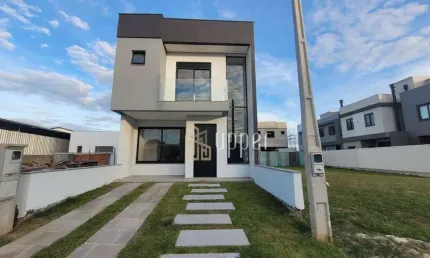 Casa com 3 dormitórios à venda, 130 m² por R$ 799.000 - Condomínio Central Square - Gravataí/RS