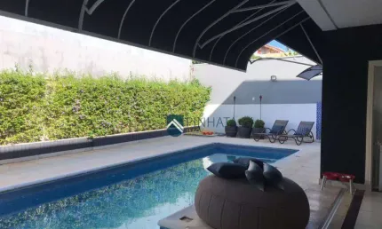 Casa com 3 dormitórios à venda, 302 m² por R$ 1.850.000,00 - Condomínio Residencial Terras do Caribe - Valinhos/SP