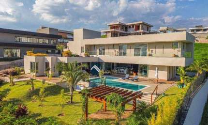 Casa com 4 dormitórios à venda, 646 m² por R$ 9.870.000 - Condomínio Campo de Toscana - Vinhedo/SP