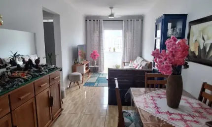 Oportunidade!amplo apartamento em prédio frente mar com 2 dormitórios e 1 suíte