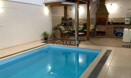 Casa com 3 dormitórios à venda, 165 m² por R$ 1.187.200,00 - Loteamento Villa Branca - Jacareí/SP