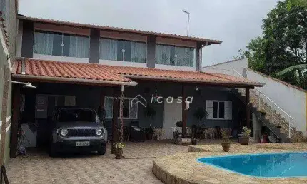 Casa com 4 dormitórios à venda, 247 m² por R$ 986.000,00 - Porto Novo - Caraguatatuba/SP