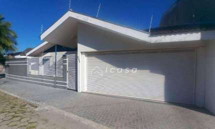 Casa com 4 dormitórios à venda, 230 m² por R$ 1.200.000,00 - Village das Flores - Caçapava/SP