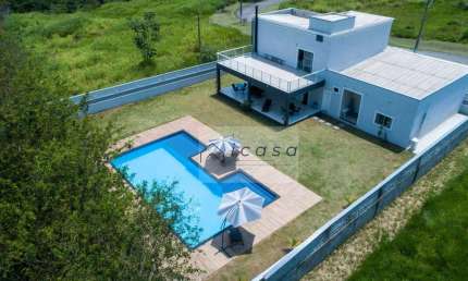 Sobrado com 3 dormitórios à venda, 300 m² por R$ 1.800.000,00 - Village da Serra - Tremembé/SP