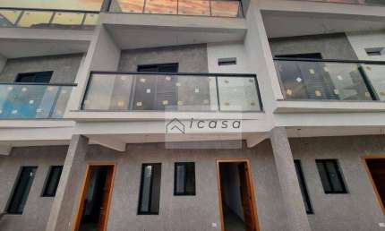 Sobrado com 2 dormitórios à venda, 148 m² por R$ 580.000,00 - Massaguaçu - Caraguatatuba/SP