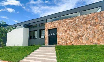 Casa com 4 dormitórios, 200 m² - venda por R$ 1.350.000,00 ou aluguel por R$ 7.400,00/mês - Condomínio Terras do Vale - Caçapava/SP