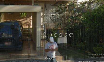 Casa com 3 dormitórios à venda, 150 m² por R$ 1.000.000,00 - Centro - Caçapava/SP