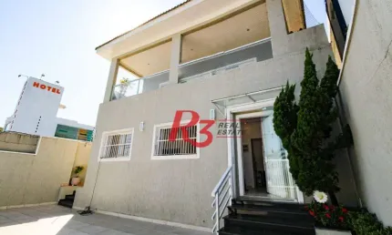 Sobrado com 6 dormitórios à venda, 340 m² por R$ 2.700.000,00 - Loteamento João Batista Julião - Guarujá/SP